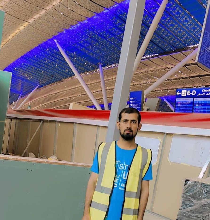 Umar Technical Services technician in a high-visibility vest during a commercial fit-out
